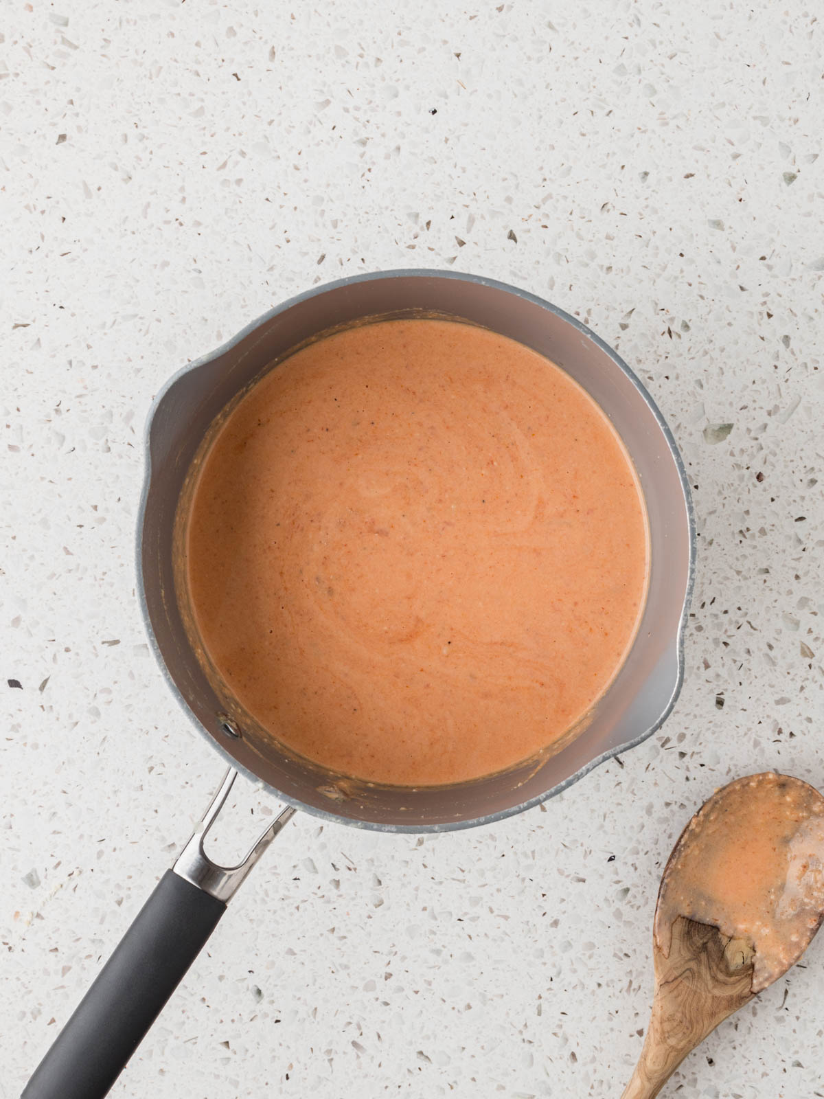 Rose sauce simmering in a sauce pan.