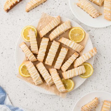 Lemon Biscotti cookies on a plate on the countertop.