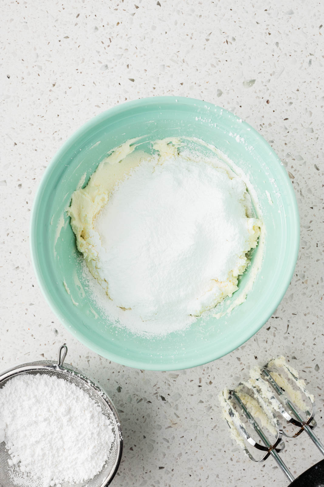 Cheese mixture plus powdered sugar.