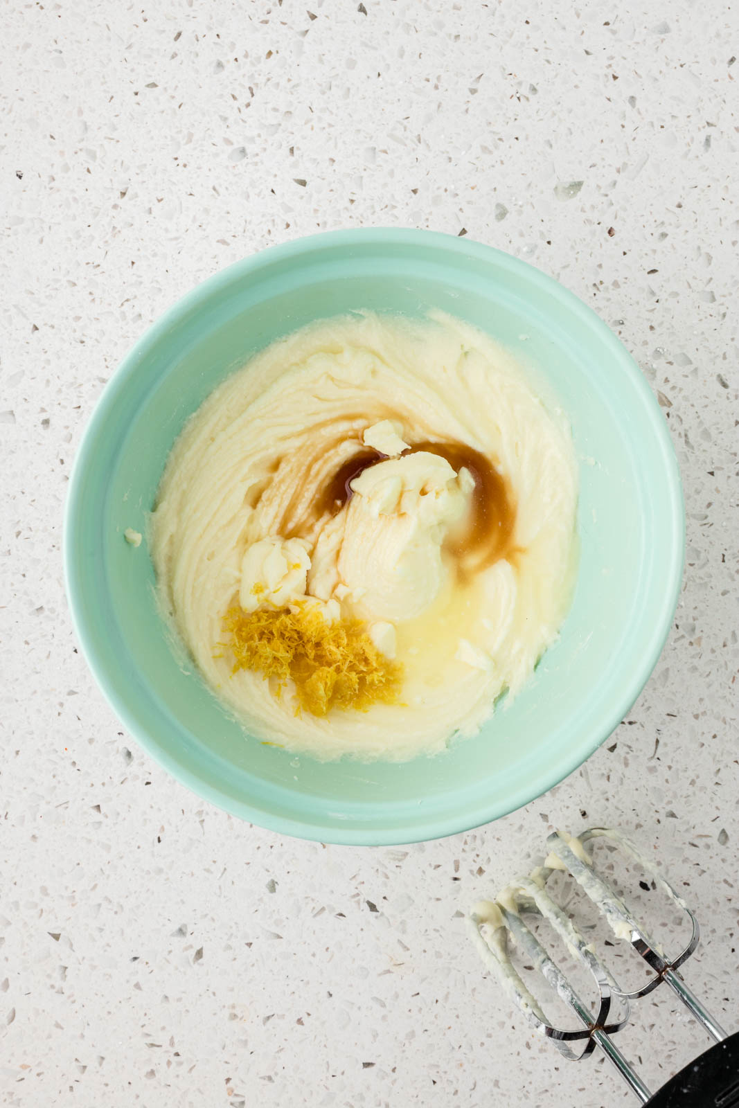 Mixture plus vanilla, lemon zest and juice.