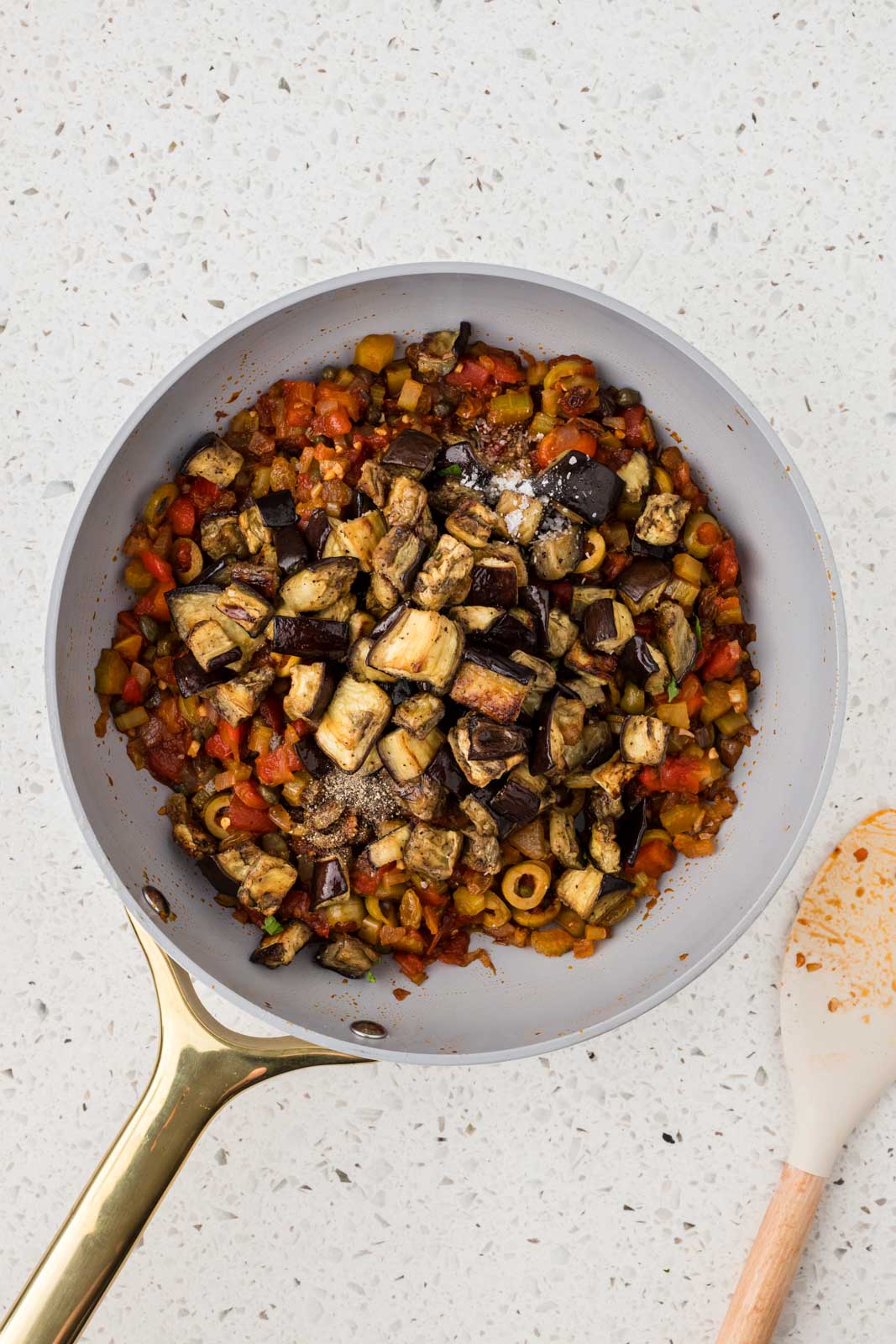 Roasted eggplant added to the mixture.