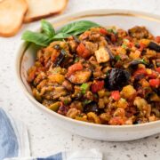 Eggplant caponata in a serving bowl.
