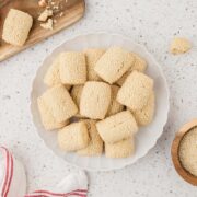 Italian sesame seed cookies on a plate.