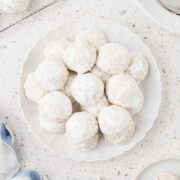 Italian wedding cookies on a plate.