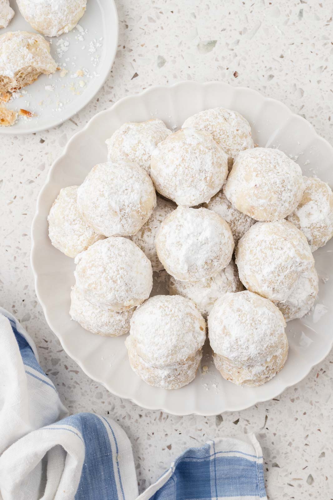 Italian wedding cookies on a plate.