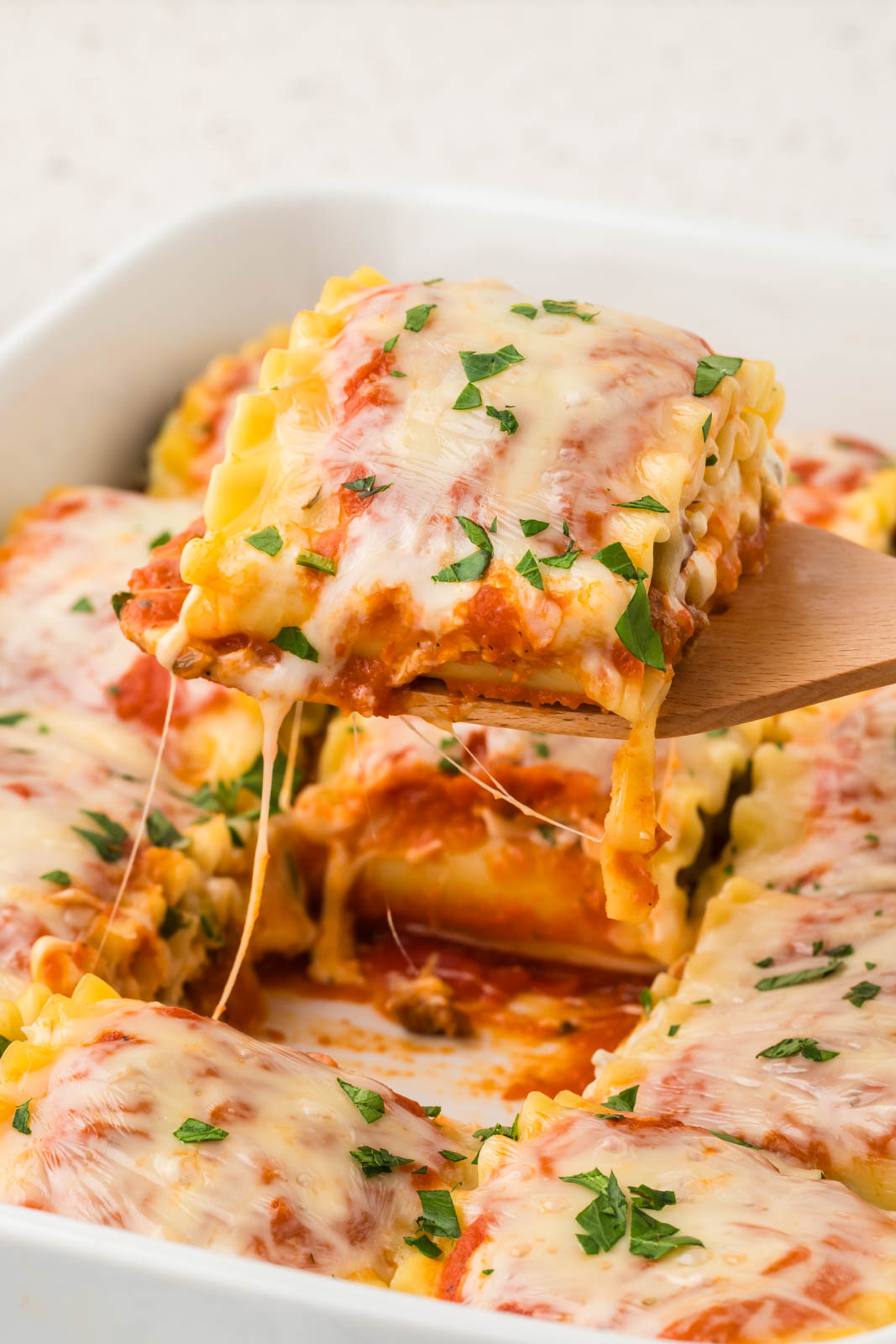 Lasagna roll ups cheese pull.