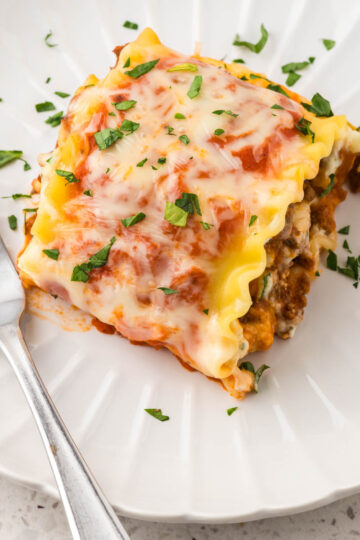 Lasagna Rollatini on a plate with a fork.
