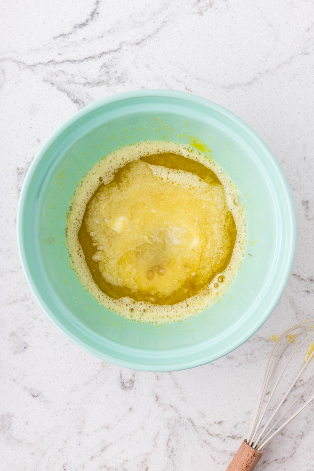 Melted butter and olive oil added to the batter.