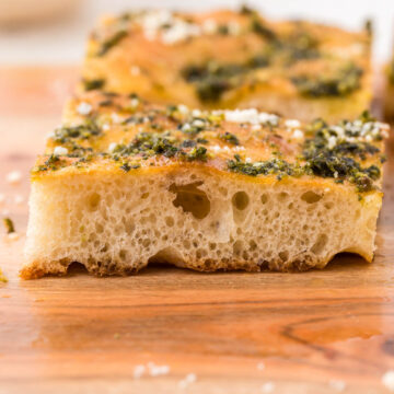 Pesto focaccia on a serving board.
