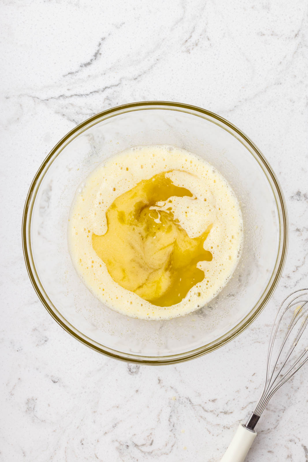 Melted butter and oil added to batter.