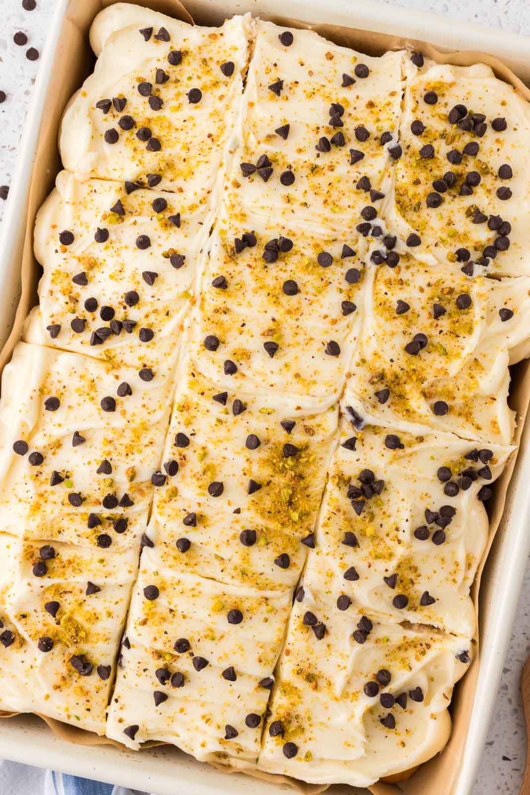 Cannoli poke cake in a pan.