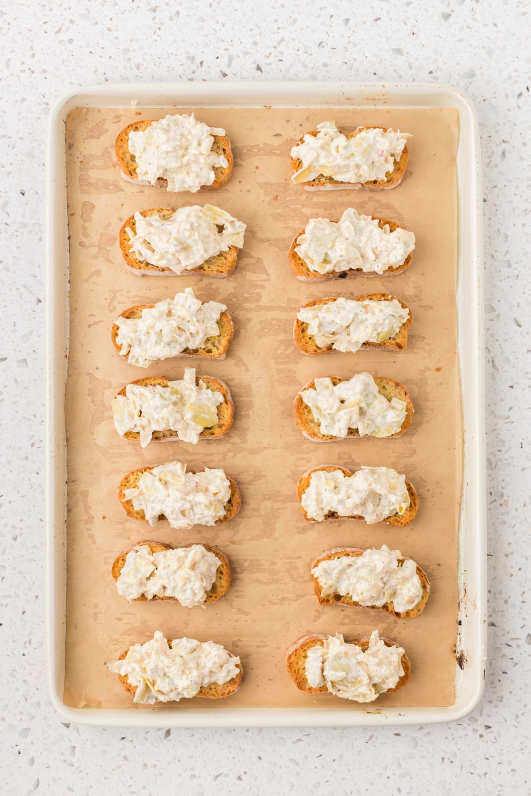 Mixture evenly distributed onto prepared bread.