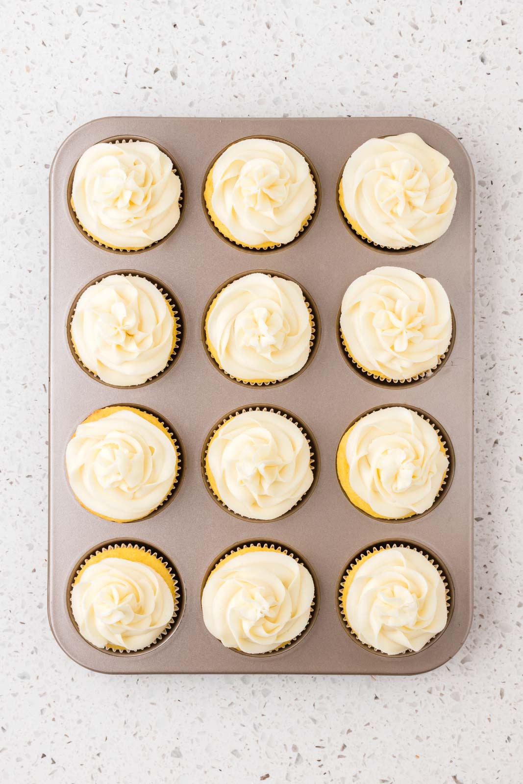 Cannoli cupcakes with icing.