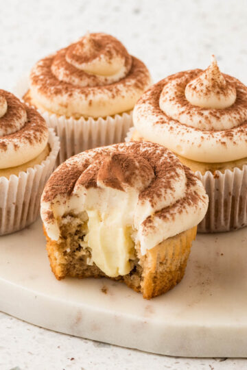 Tiramisu cupcakes on a marble platter