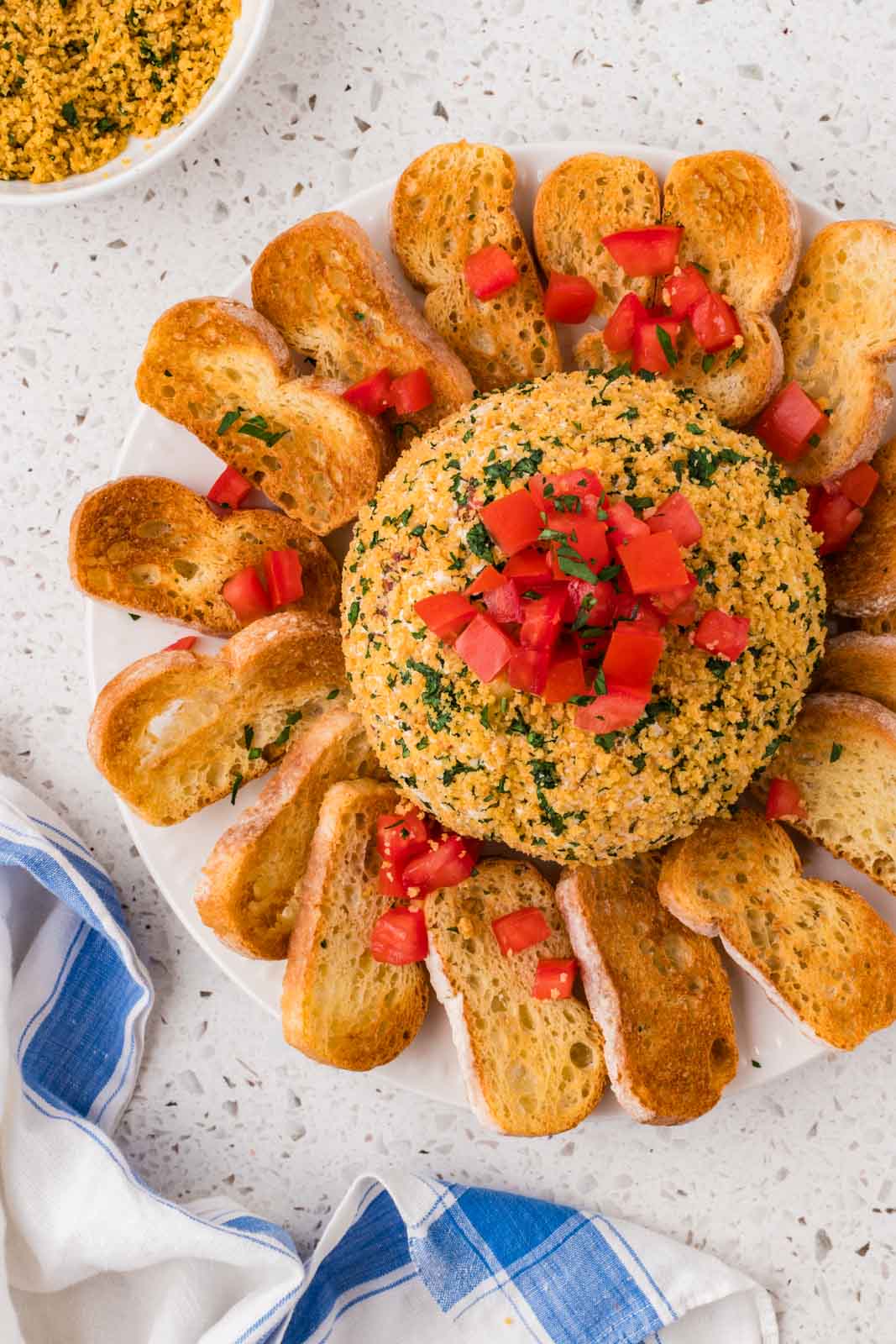 Bruschetta cheeseball on a platter