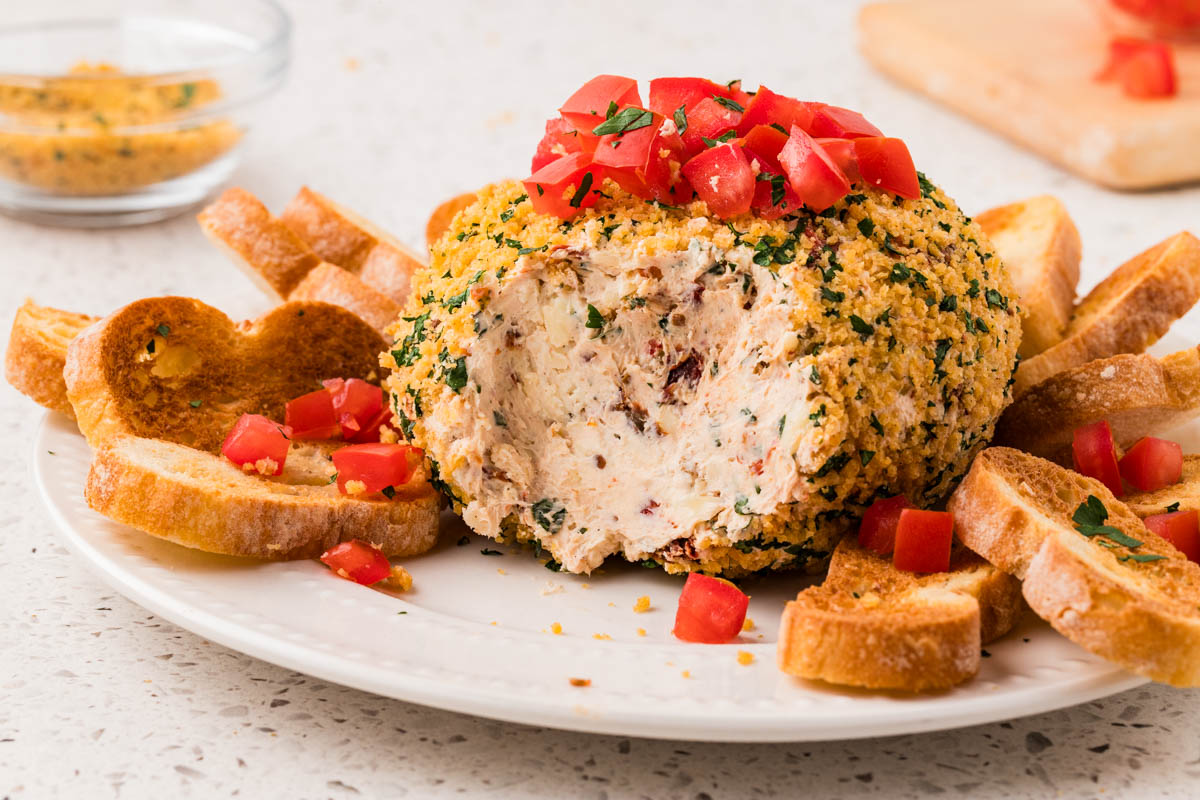 Bruschetta cheeseball on a platter