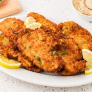 Chicken cutlets on a platter