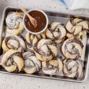 Nutella puff pastry twists on a platter.
