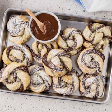 Nutella puff pastry twists on a platter.