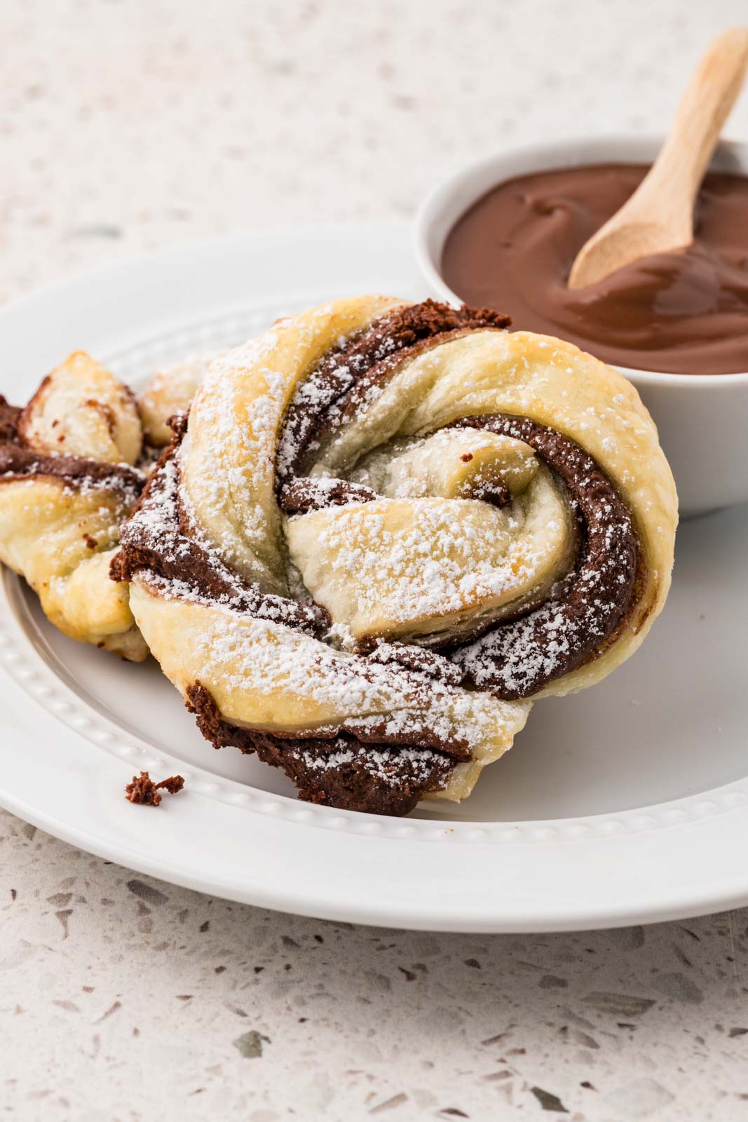 Nutella puff pasty on a plate. 