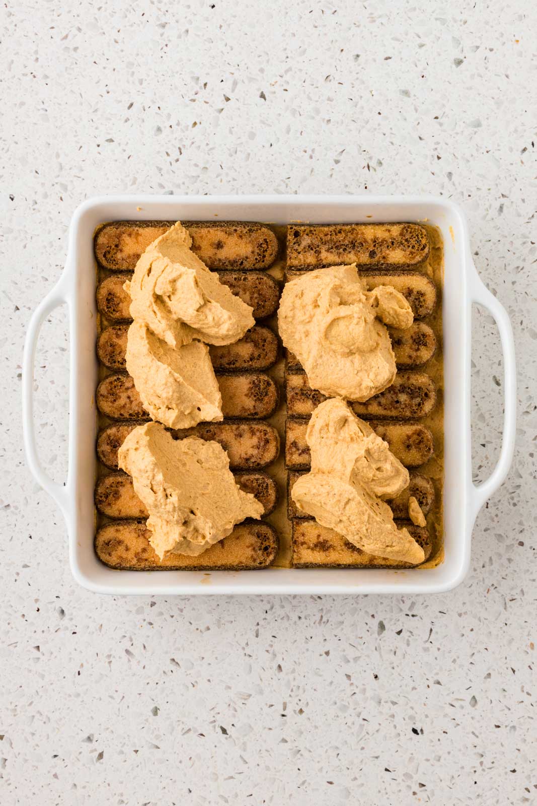 Pumpkin mixture over lady fingers. 