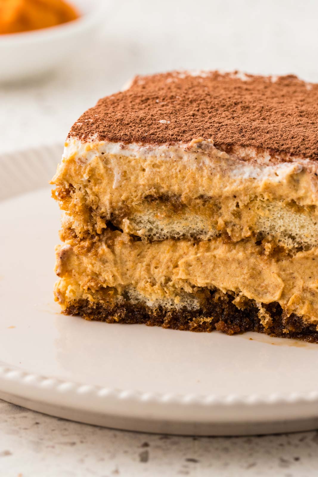 Pumpkin tiramisu on a plate. 